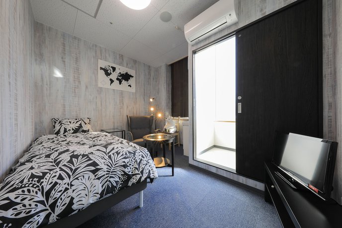 Imagen de la habitación del Hotel Izu Village Heso. Foto 7