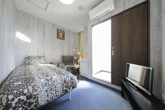 Imagen de la habitación del Hotel Izu Village Heso. Foto 8