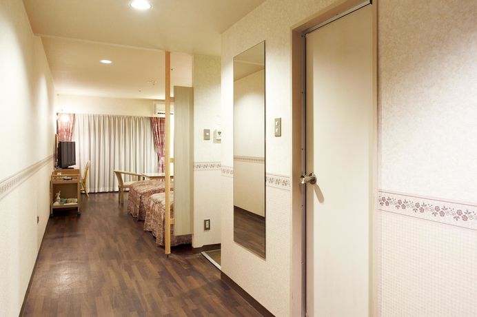 Imagen de la habitación del Hotel Izukogen Wanwan Paradise Condominium. Foto 2