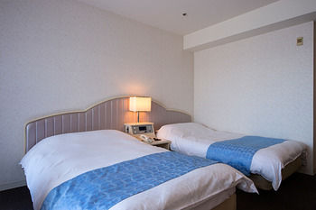 Imagen de la habitación del Hotel Izukogen Wanwan Paradise and Cottage. Foto 1