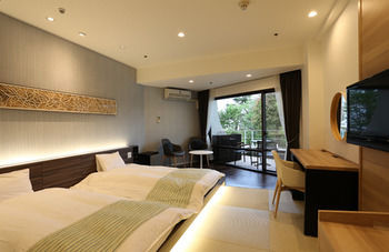 Imagen de la habitación del Hotel Izukogen Wanwan Paradise and Cottage. Foto 2
