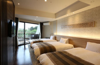 Imagen de la habitación del Hotel Izukogen Wanwan Paradise and Cottage. Foto 3