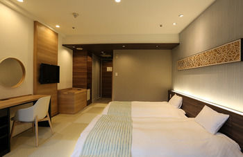 Imagen de la habitación del Hotel Izukogen Wanwan Paradise and Cottage. Foto 9