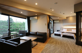 Imagen de los interiores del Hotel Izukogen Wanwan Paradise and Cottage. Foto 14