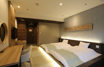 Imagen de la habitación del Hotel Izukogen Wanwan Paradise and Cottage. Foto 11