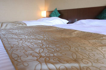 Imagen de la habitación del Hotel Izukogen Wanwan Paradise and Cottage. Foto 12