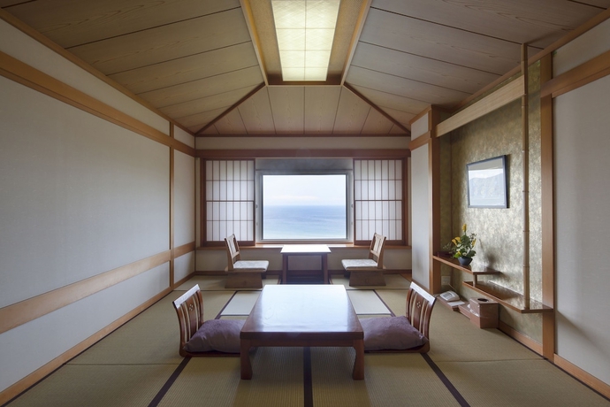 Imagen de la habitación del Hotel Izukyu. Foto 4