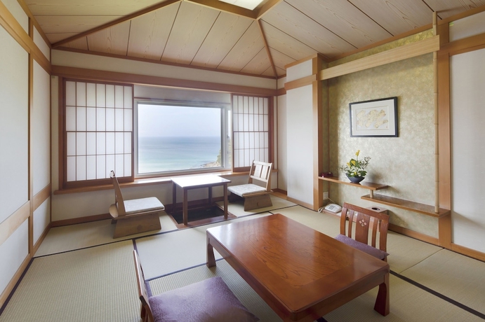 Imagen de la habitación del Hotel Izukyu. Foto 8