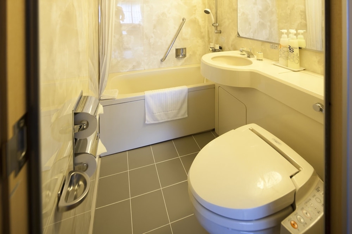 Imagen de la habitación del Hotel Izukyu. Foto 10