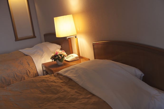 Imagen de la habitación del Hotel Izukyu. Foto 11