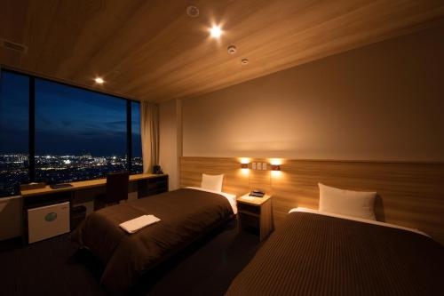 Imagen de la habitación del Hotel Izumisano Center. Foto 6