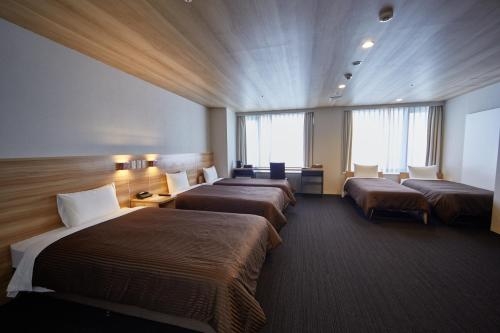 Imagen de la habitación del Hotel Izumisano Center. Foto 10