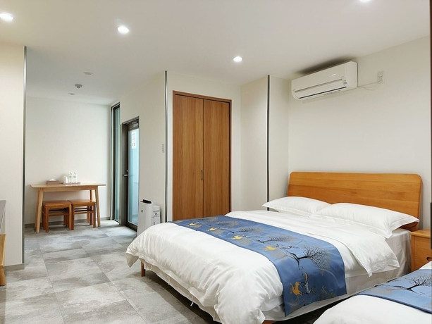 Imagen de la habitación del Hotel Izumisano Home. Foto 9