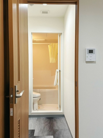 Imagen de la habitación del Hotel Izumisano Home. Foto 19
