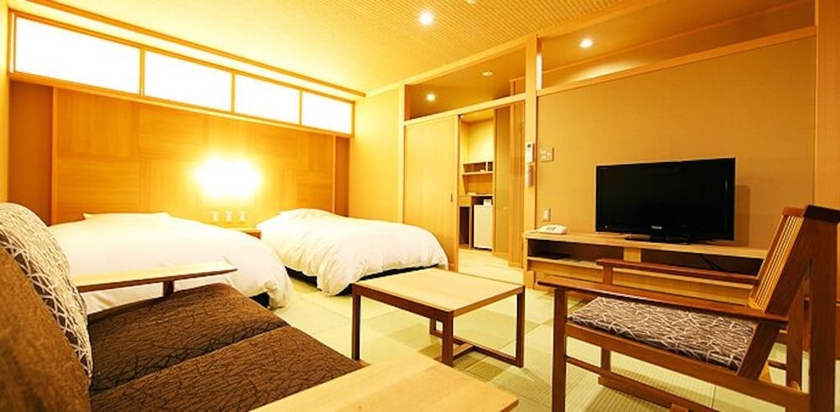 Imagen de la habitación del Hotel Izunagaokaonsen Yumegurinoyado Yoshiharu. Foto 6