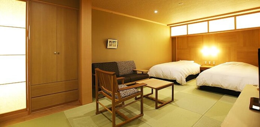 Imagen de la habitación del Hotel Izunagaokaonsen Yumegurinoyado Yoshiharu. Foto 7