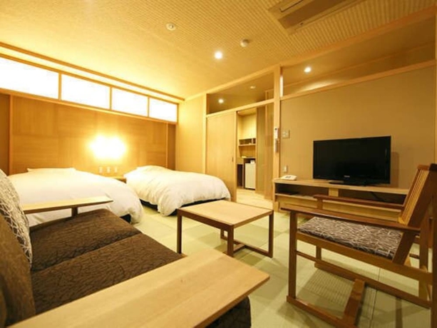 Imagen de la habitación del Hotel Izunagaokaonsen Yumegurinoyado Yoshiharu. Foto 14