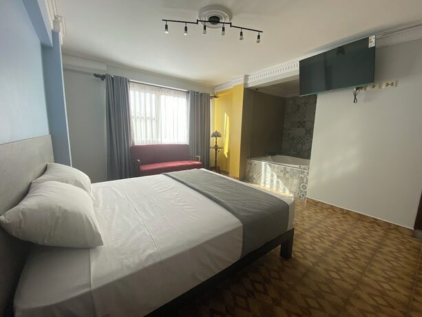 Imagen de la habitación del Hotel Izza. Foto 14