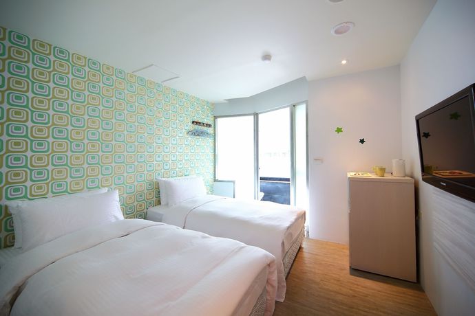 Imagen de la habitación del Hotel J Jiaoxi. Foto 8