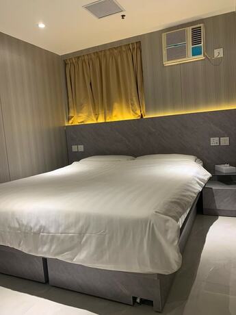 Imagen de la habitación del Hotel J, Kowloon. Foto 18