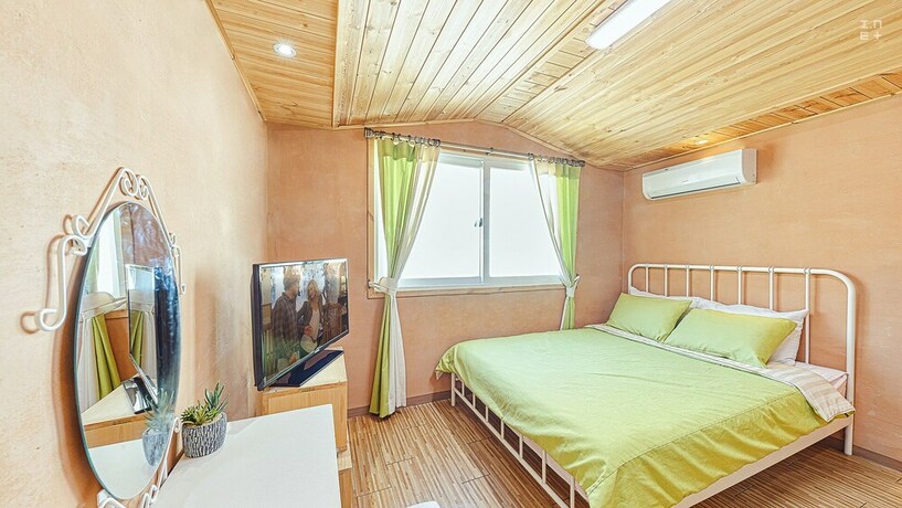 Imagen de la habitación del Hotel J Mong. Foto 12