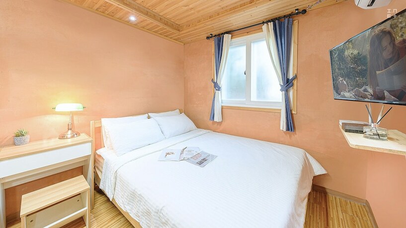 Imagen de la habitación del Hotel J Mong. Foto 14