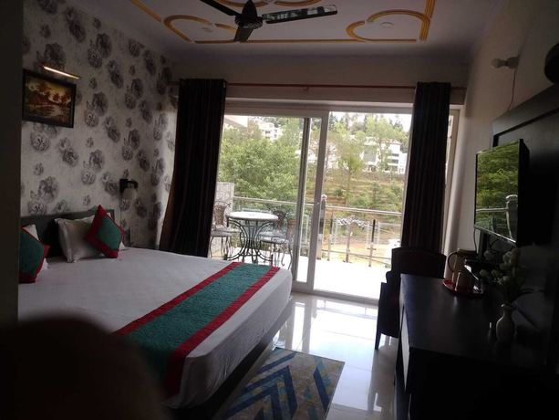 Imagen de la habitación del Hotel J P Regency. Foto 9