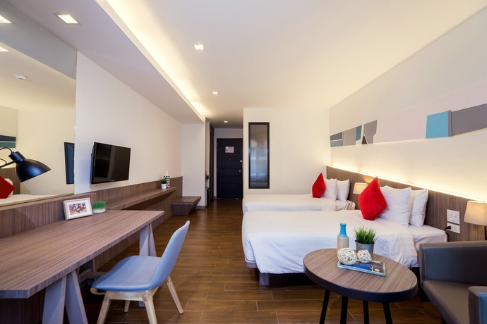 Imagen de la habitación del Hotel J Pattaya. Foto 11