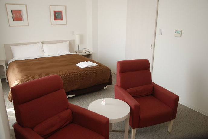 Imagen de la habitación del Hotel J Rinku. Foto 4