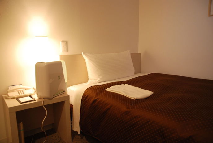 Imagen de la habitación del Hotel J Rinku. Foto 5