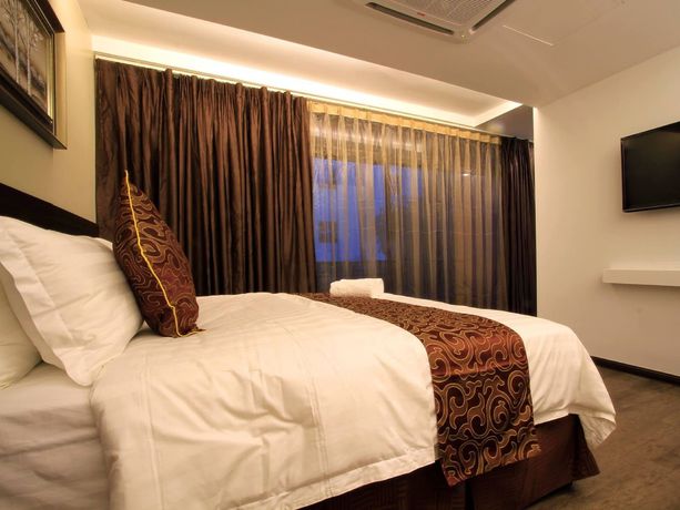 Imagen de la habitación del Hotel J Suites. Foto 13