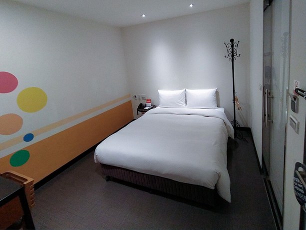 Imagen de la habitación del Hotel J Taoyuan. Foto 11