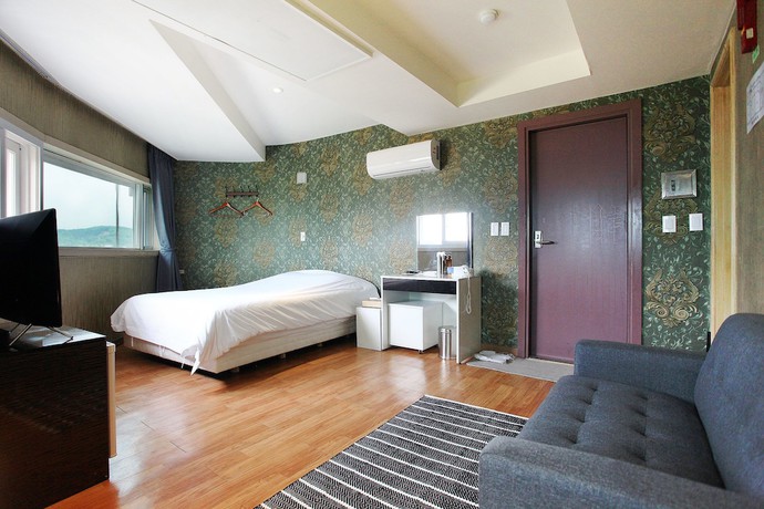 Imagen de la habitación del Hotel J hotel. Foto 20