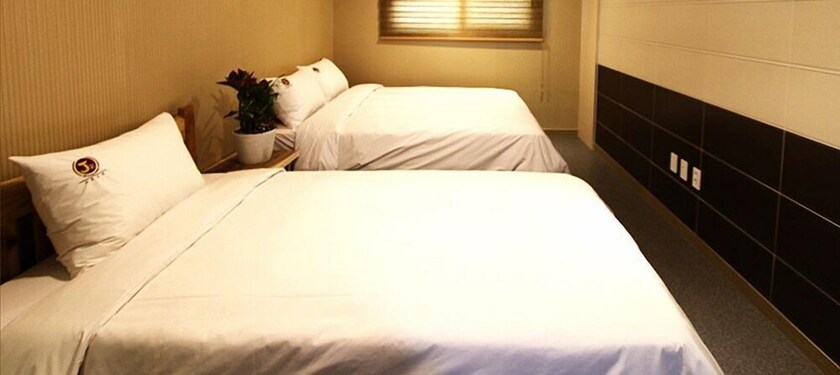 Imagen de la habitación del Hotel J2 Family Jeju. Foto 16