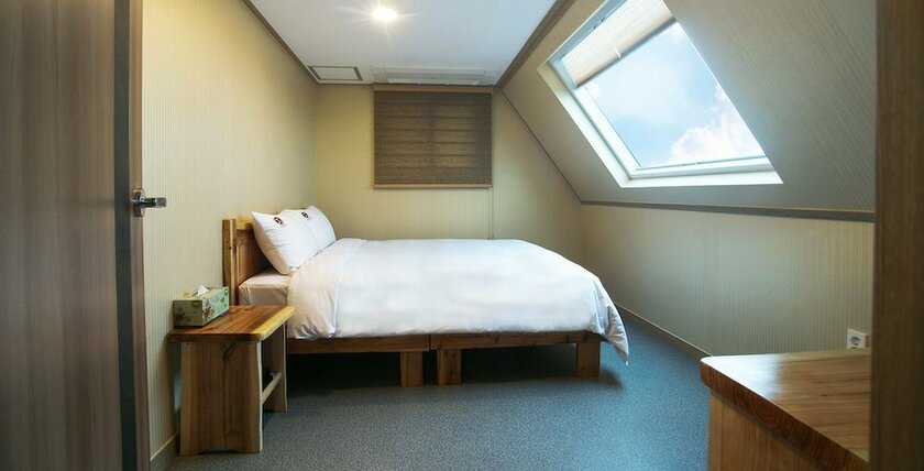 Imagen de la habitación del Hotel J2 Family Jeju. Foto 17