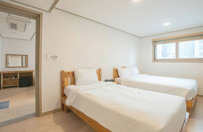 Imagen de la habitación del Hotel J2 Family Jeju. Foto 23