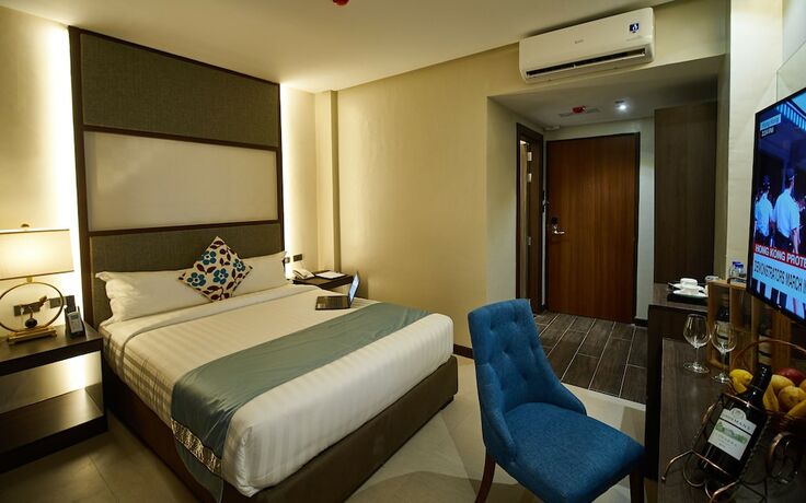 Imagen de la habitación del Hotel J7 Plaza Hotel. Foto 11