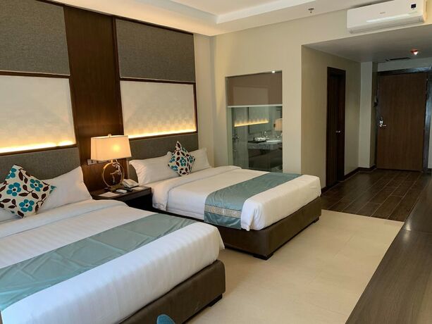 Imagen de la habitación del Hotel J7 Plaza Hotel. Foto 15