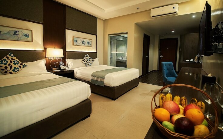 Imagen de la habitación del Hotel J7 Plaza Hotel. Foto 16