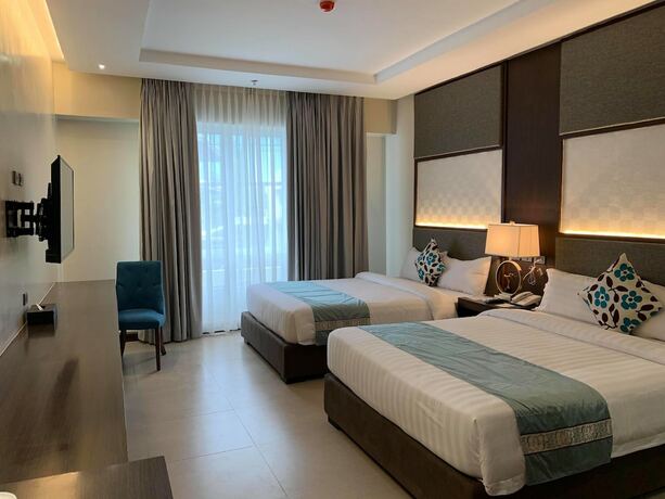 Imagen de la habitación del Hotel J7 Plaza Hotel. Foto 18