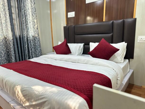 Imagen de la habitación del Hotel JAI SANTOSHI DHAAM. Foto 19