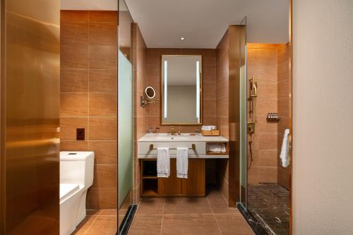 Imagen de la habitación del Hotel JAMES JOYCE COFFETEI- Guangzhou Beijing Road Metro Station Pedestrian Street Branch. Foto 14
