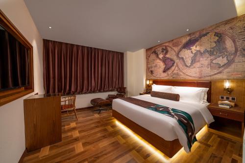 Imagen de la habitación del Hotel JAMES JOYCE COFFETEI- Guangzhou Beijing Road Metro Station Pedestrian Street Branch. Foto 15
