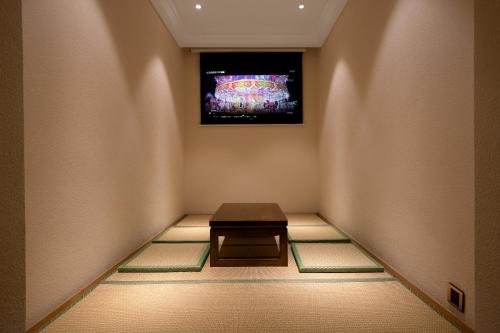 Imagen de la habitación del Hotel JAMES JOYCE COFFETEI- Guangzhou Beijing Road Metro Station Pedestrian Street Branch. Foto 19