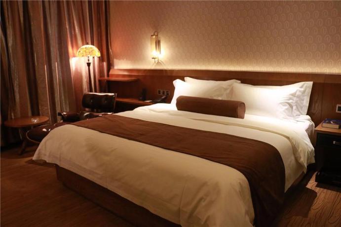 Imagen de la habitación del Hotel JAMES JOYCE COFFETEL XUZHOU PEIXIAN NEW DISTRICT J. Foto 1