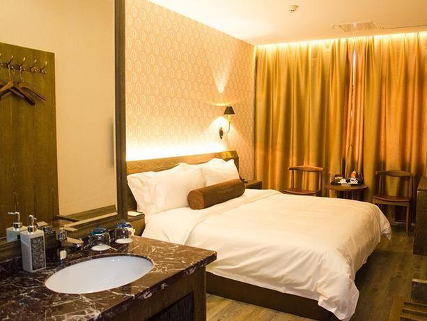 Imagen de la habitación del Hotel JAMES JOYCE COFFETELA SUQIAN BUS STATION. Foto 5