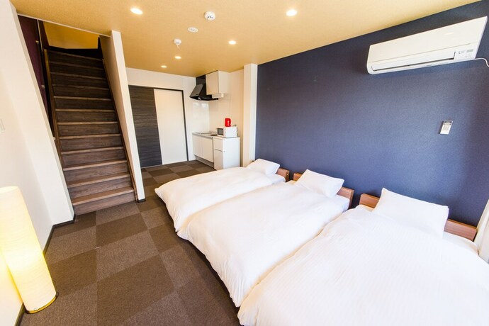Imagen de la habitación del Hotel JAPANING KUJO. Foto 6