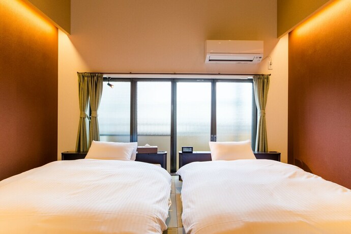 Imagen de la habitación del Hotel JAPANING KUJO. Foto 7