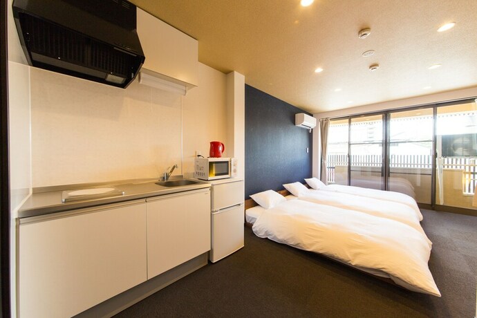 Imagen de la habitación del Hotel JAPANING KUJO. Foto 8