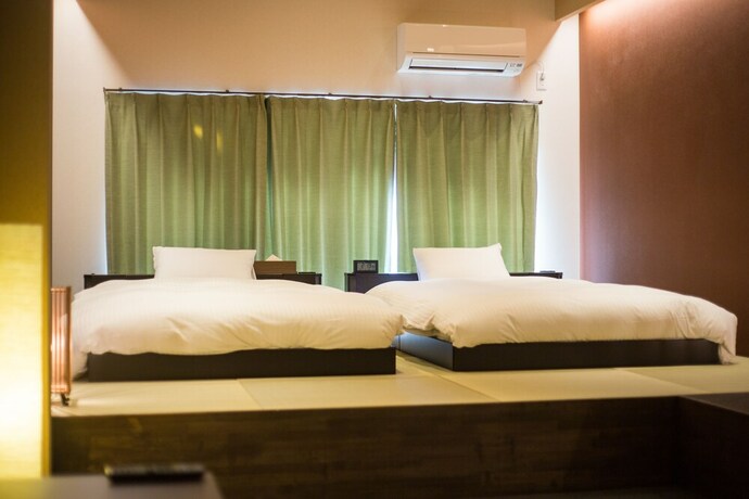 Imagen de la habitación del Hotel JAPANING KUJO. Foto 9
